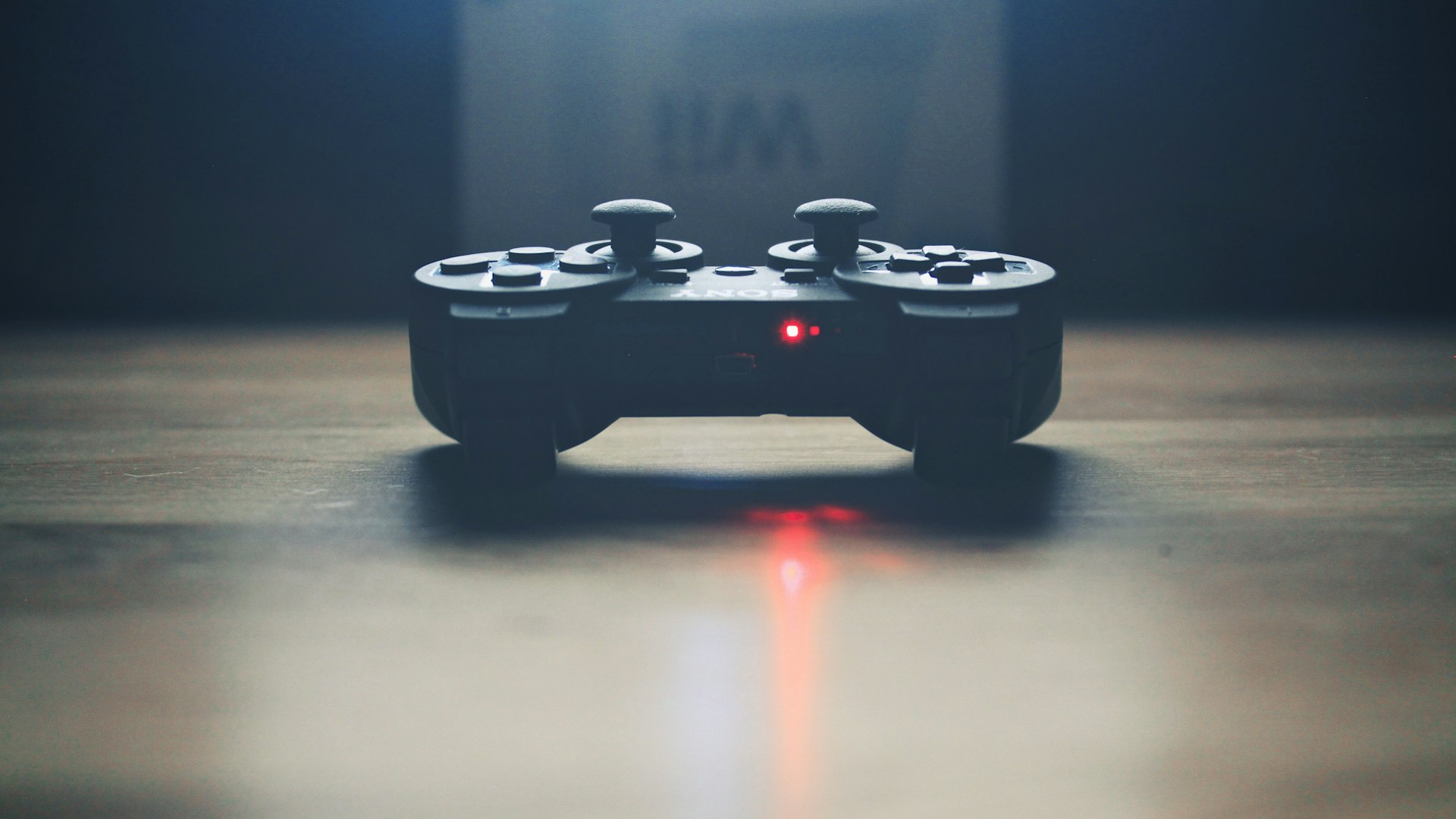 Warm-lit gaming setup with mechanical keyboard and dice
